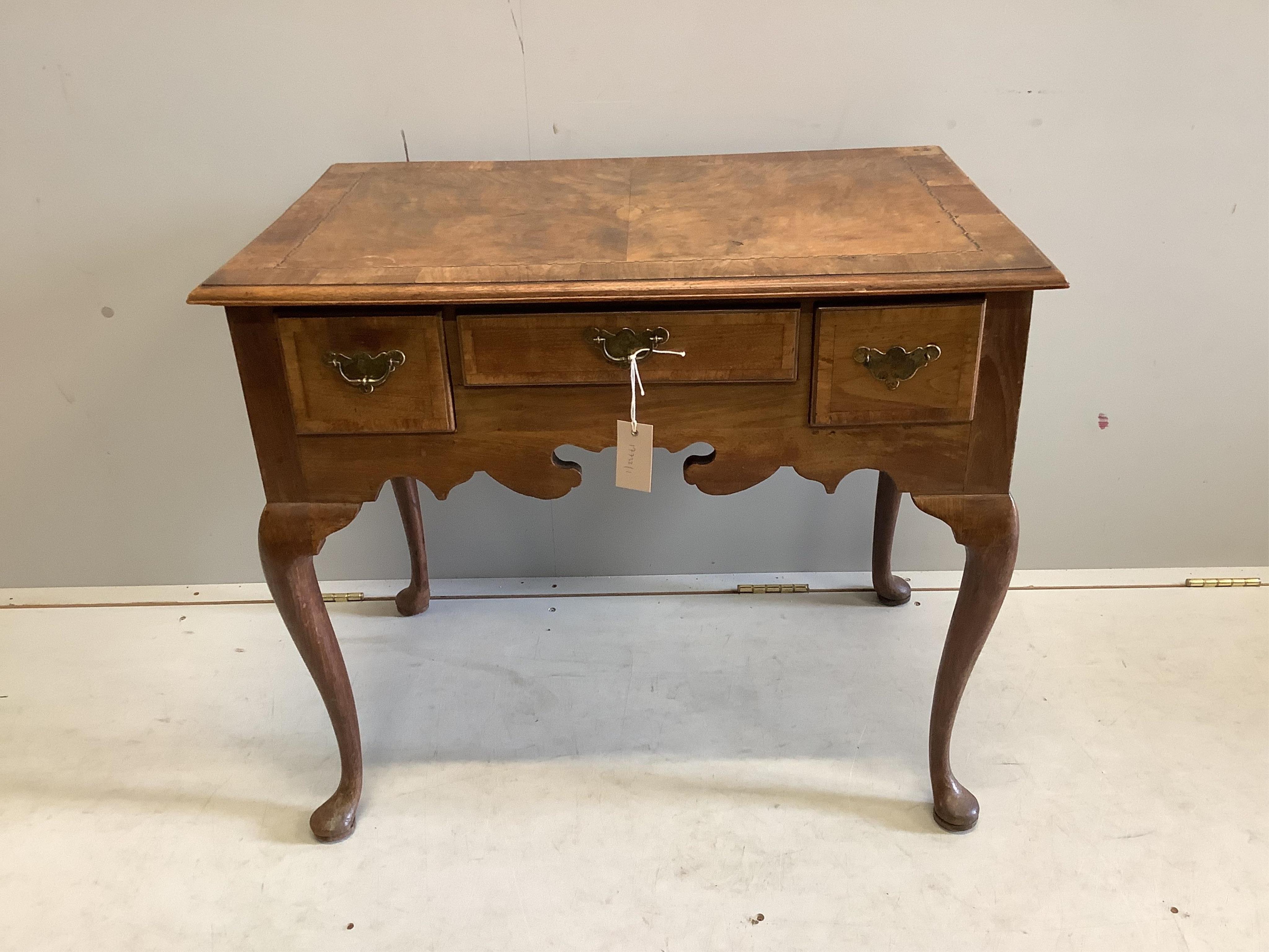 An 18th century inlaid walnut lowboy, width 77cm, depth 50cm, height 67cm. Condition - fair